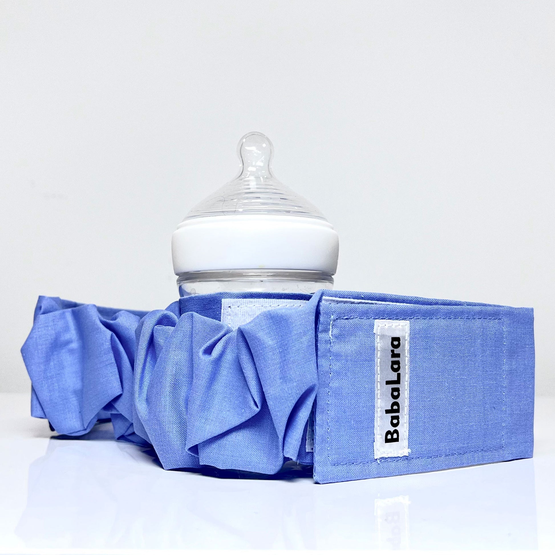 belt accessory holds tightly to sippy cups and baby bottles 